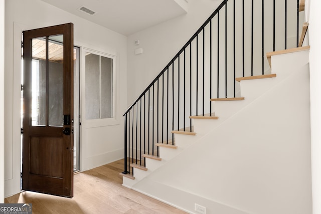 foyer with light wood-type flooring