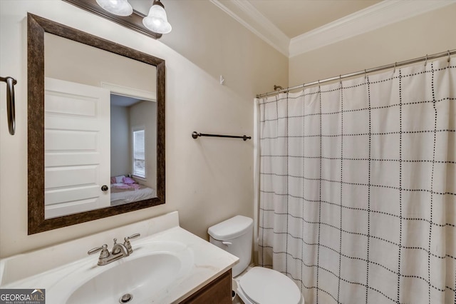 bathroom featuring curtained shower, toilet, vanity, and ornamental molding