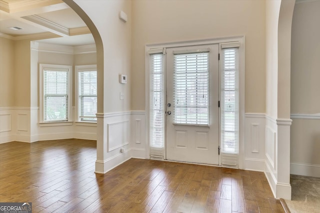 entryway featuring beamed ceiling, dark wood-type flooring, crown molding, and coffered ceiling