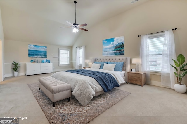 bedroom with carpet flooring, high vaulted ceiling, and ceiling fan