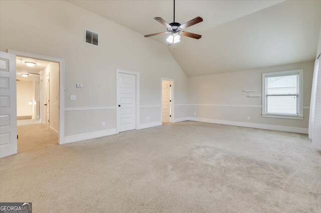 interior space with ceiling fan and high vaulted ceiling