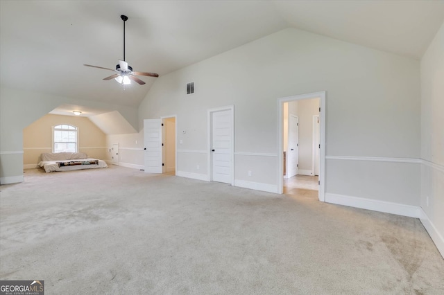 additional living space with light carpet, ceiling fan, and lofted ceiling