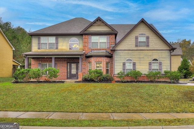 view of front of home featuring a front yard