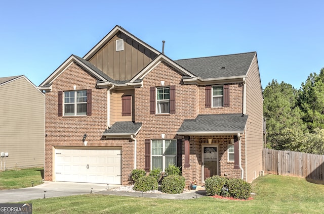 view of front of home featuring a garage and a front lawn