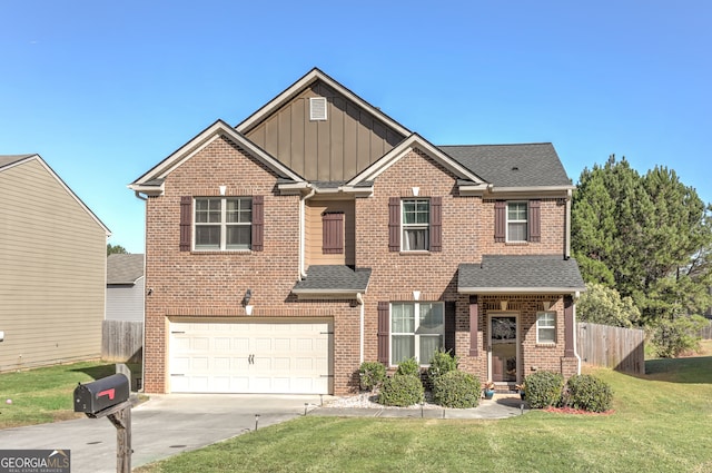 view of front of home featuring a garage and a front lawn