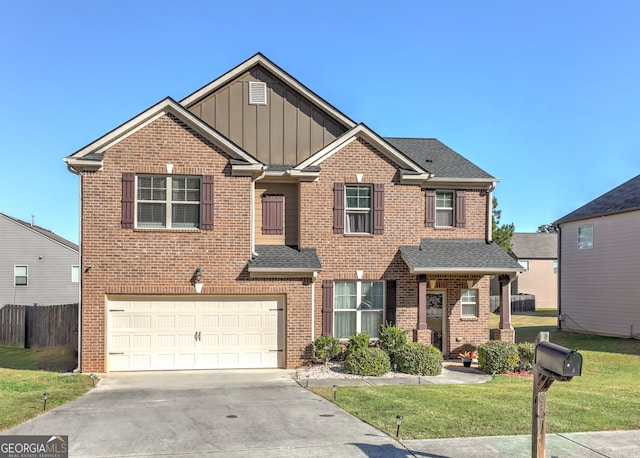 view of front of house with a garage and a front yard