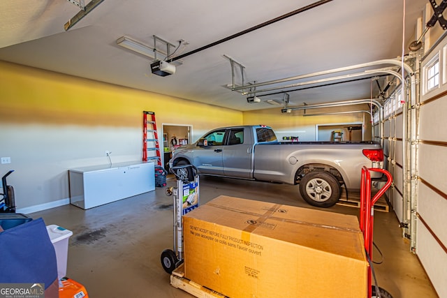 garage featuring a garage door opener