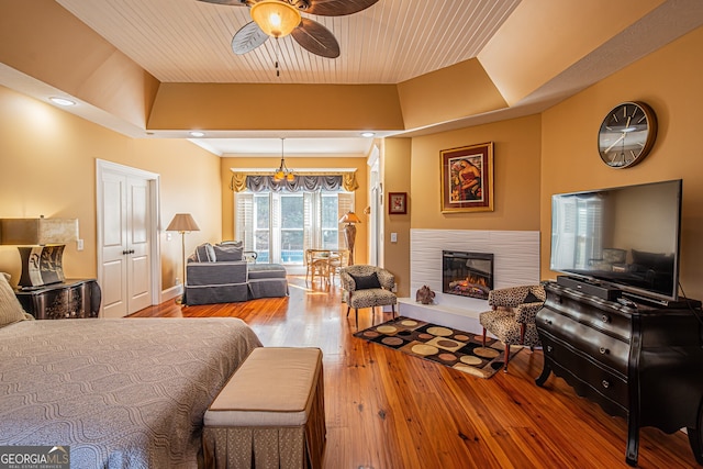 bedroom featuring hardwood / wood-style floors and ceiling fan