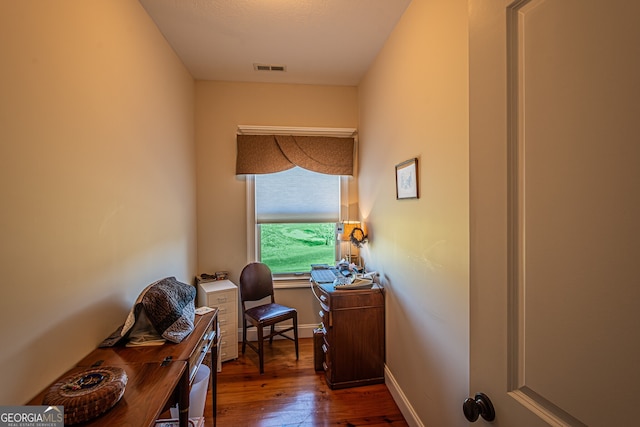 hall with dark hardwood / wood-style floors