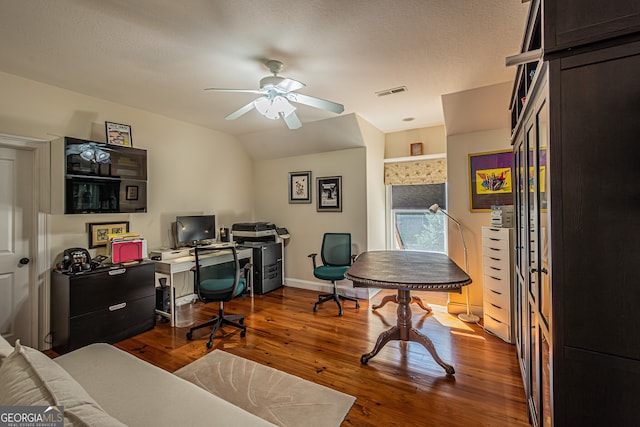 office featuring ceiling fan, wood-type flooring, and a textured ceiling