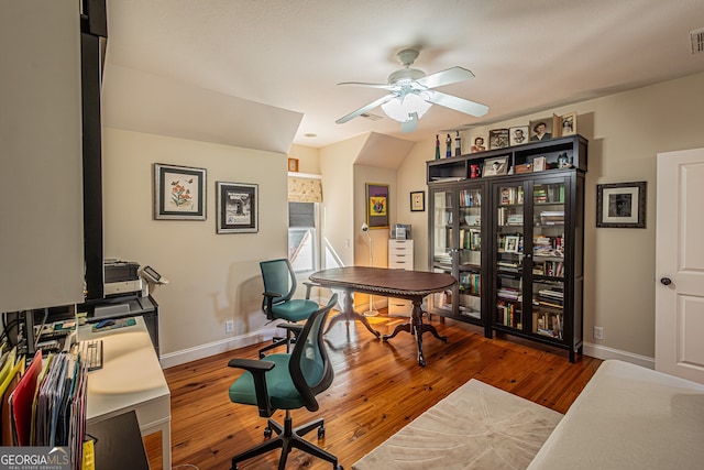 home office with ceiling fan and wood-type flooring