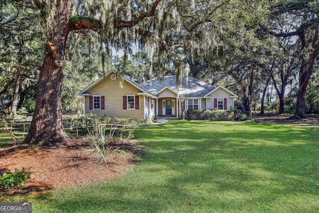 ranch-style house with a front lawn