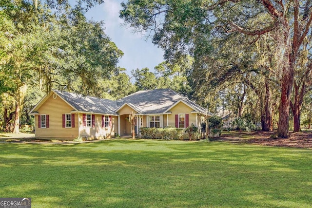 ranch-style house with a front yard