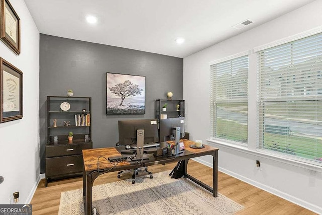 office area featuring plenty of natural light and light wood-type flooring