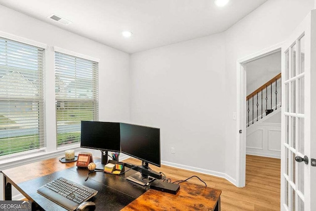 office space featuring wood-type flooring