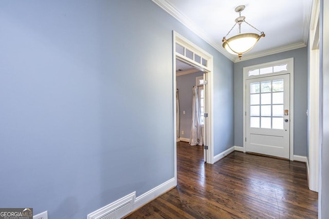 foyer featuring crown molding and dark hardwood / wood-style flooring