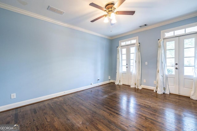 unfurnished room with crown molding, french doors, and dark hardwood / wood-style floors