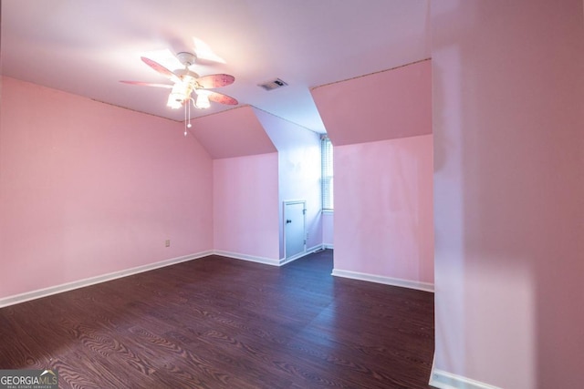 bonus room featuring vaulted ceiling, ceiling fan, and dark hardwood / wood-style floors