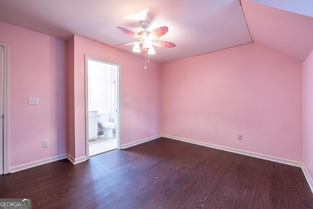 unfurnished room featuring ceiling fan, dark hardwood / wood-style flooring, and lofted ceiling