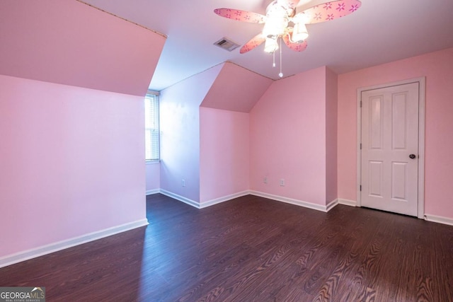 bonus room with dark hardwood / wood-style floors, ceiling fan, and lofted ceiling