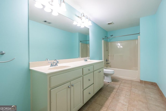 full bathroom with shower / tub combination, vanity, and toilet