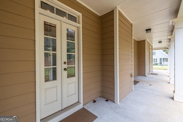 doorway to property featuring french doors