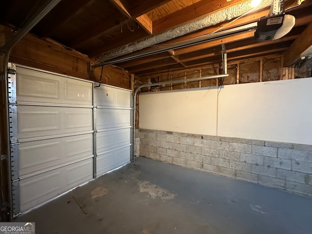 garage featuring a garage door opener