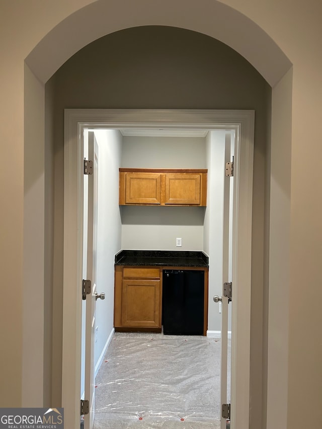 hallway with light carpet