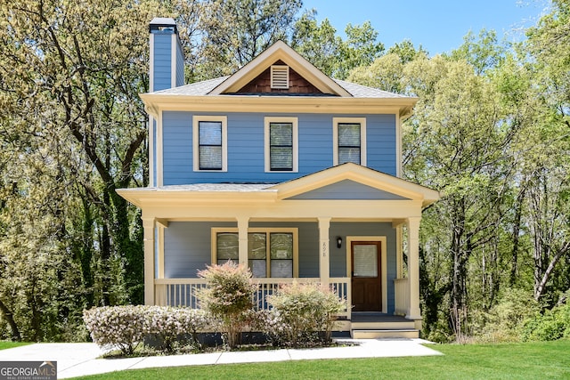 view of front of property featuring covered porch