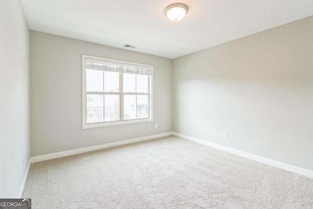 view of carpeted spare room