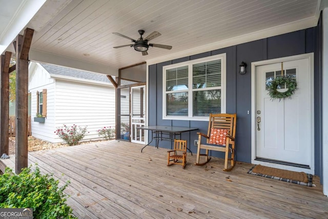 deck featuring a porch and ceiling fan