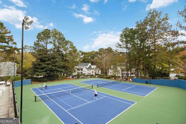 view of sport court featuring basketball hoop