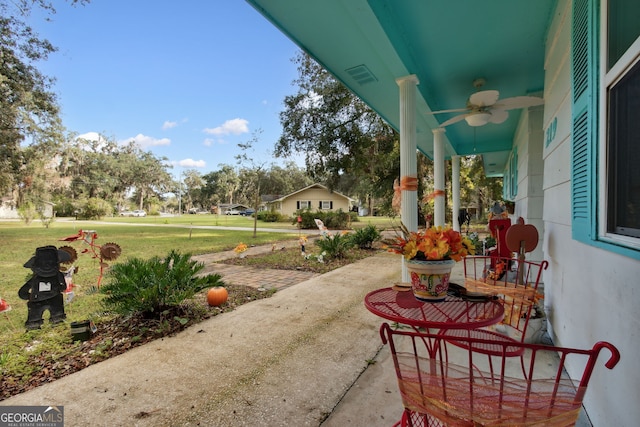 view of patio featuring ceiling fan