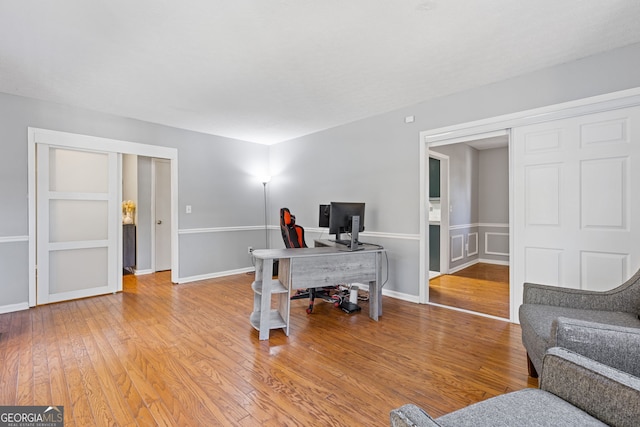 office with hardwood / wood-style floors