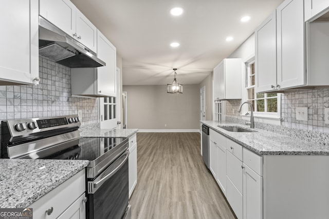 kitchen with sink, white cabinets, and appliances with stainless steel finishes