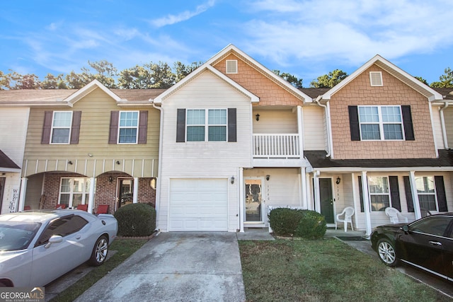 multi unit property featuring a garage