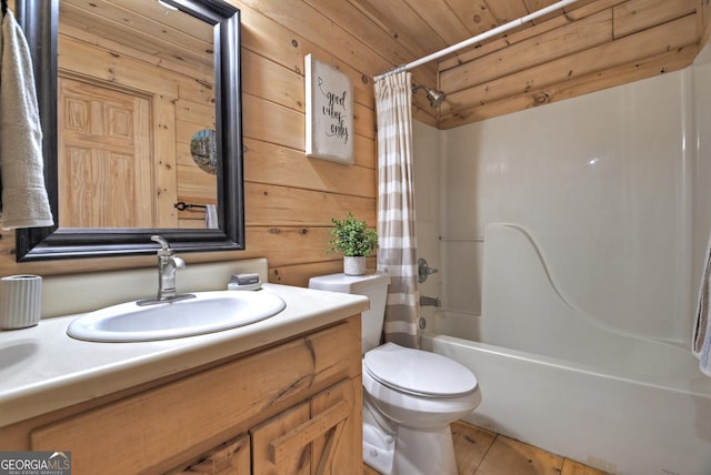 full bathroom featuring wood walls, toilet, vanity, wood ceiling, and shower / tub combo