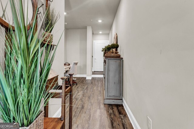 hall featuring dark hardwood / wood-style floors