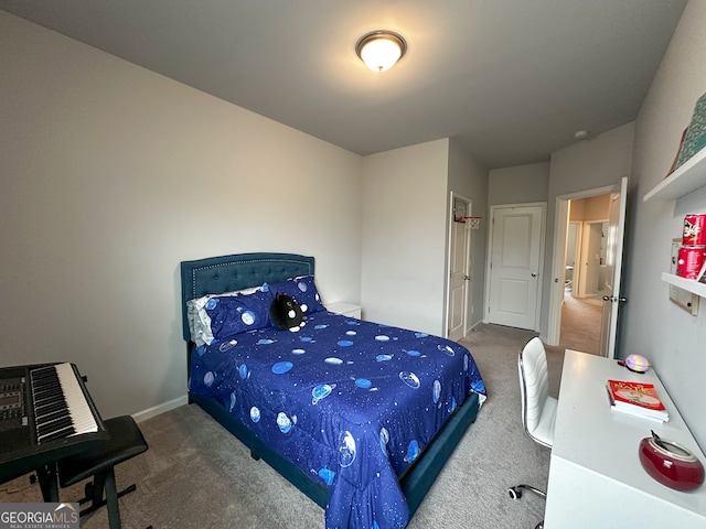 bedroom with dark colored carpet