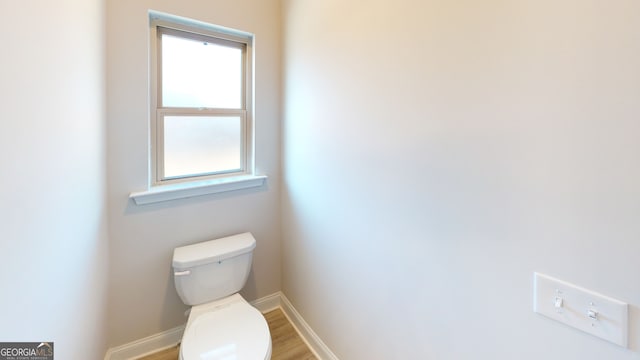 walk in closet featuring light colored carpet