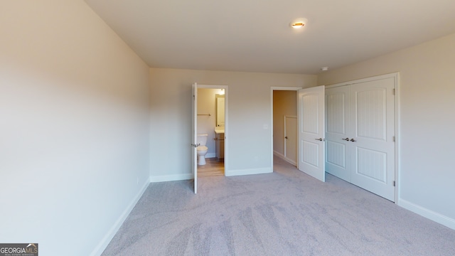 carpeted spare room with ceiling fan and crown molding