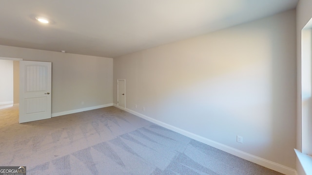 empty room featuring carpet flooring