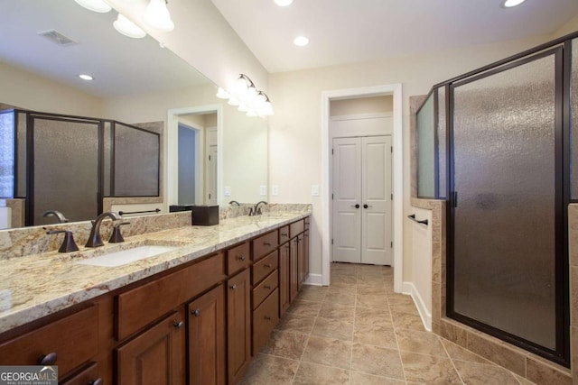 bathroom featuring vanity and walk in shower