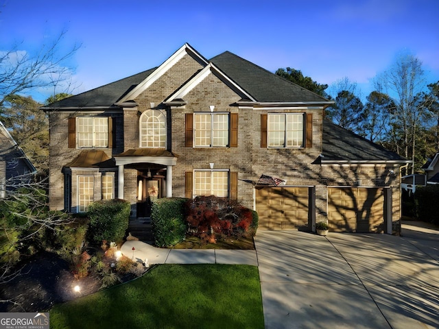 view of front of home with a garage