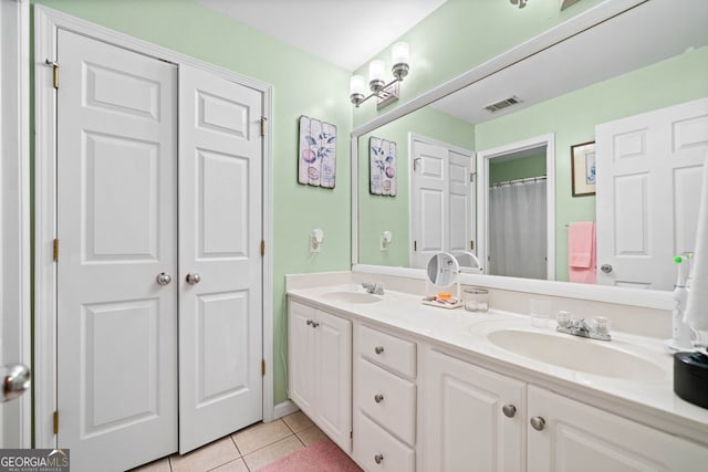 bathroom featuring vanity and tile patterned floors