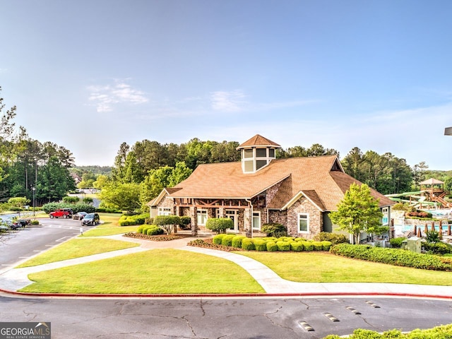 view of front of house with a front lawn