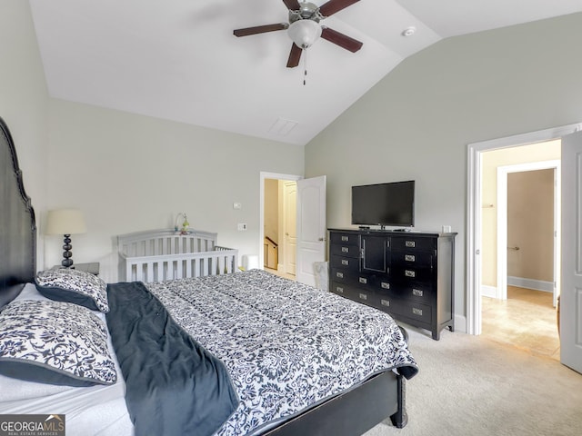 bedroom with a ceiling fan, lofted ceiling, light colored carpet, and baseboards