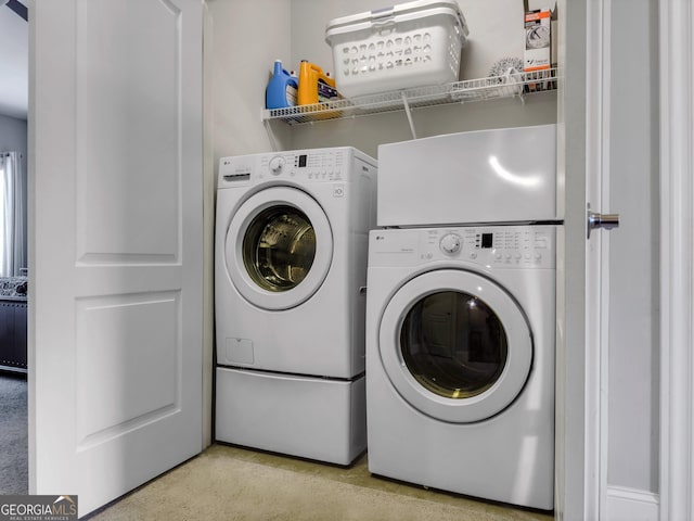 washroom with washer and dryer