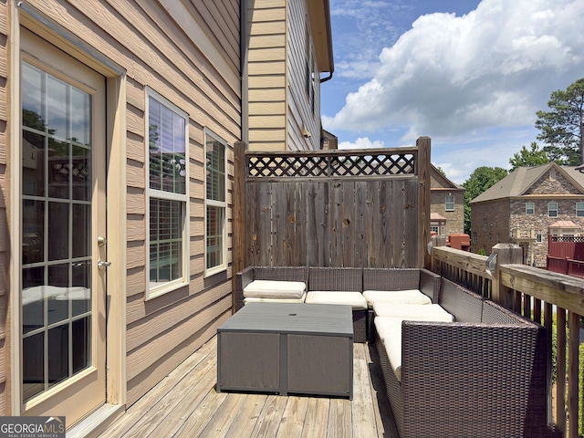 deck featuring an outdoor living space