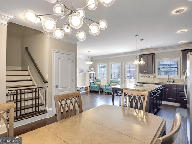 dining room featuring stairway, dark wood finished floors, and crown molding